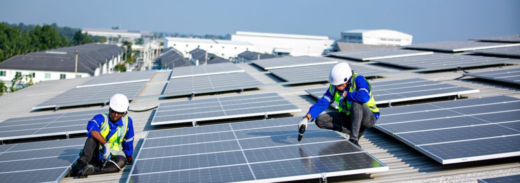 Technology solar panel Engineer service check installation solar cell on the roof of a home in California. technician checks the maintenance of the solar panels, engineering team working on checking and maintenance on panels. green energy for life on California home roof.
