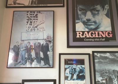 interior wall of posters at paisanos